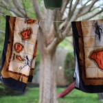 (Towels hanging on the clothesline, a sure sign that summer is coming.)