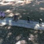 (I saw these boots at the park last week.  Their owners, three young sisters, kicked them off to climb the jungle gym.)