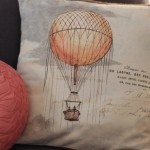 (My hot air balloon pillow cover by Jolie Marche via Etsy.)