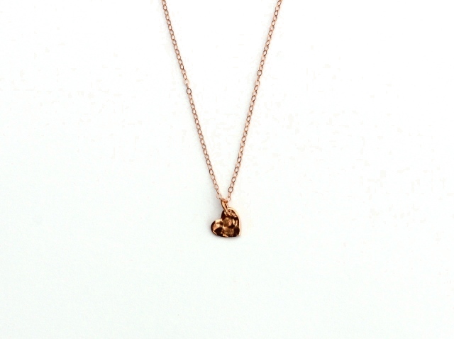 Walking with Cake: Hammered Rose Gold Necklace by Project Dahlia, via Etsy