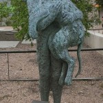 (Lady Hare Holding Dog. A precious statue at Zach Theatre.)