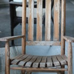 (An old rocking chair at the river house.)