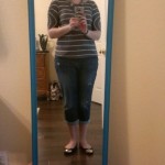 (A striped blouse with boyfriend jeans.)