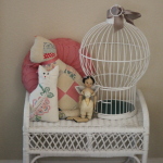 (A little vignette in my hallway. That doll ends up in the cage on occasion.)